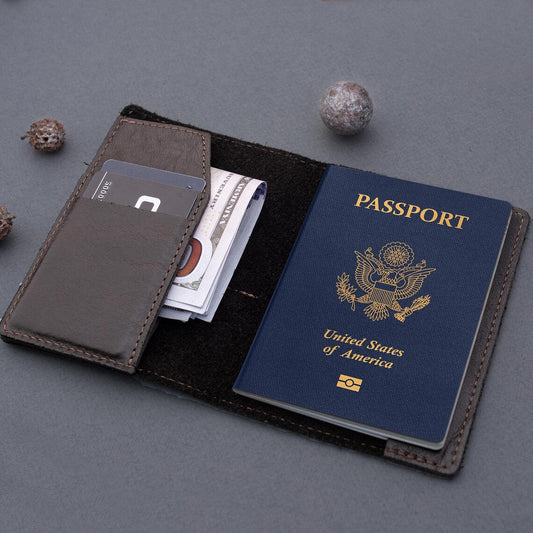 Leather passport cover with hidden AirTag pocket