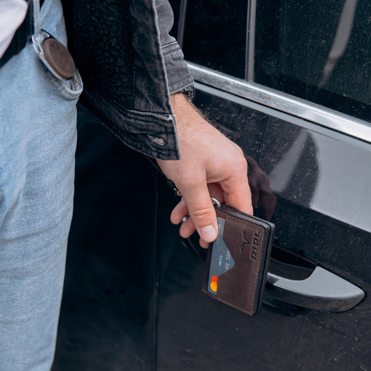 Handmade leather EDC wallet with magnetic closure, zip pocket and ID window by RIDL