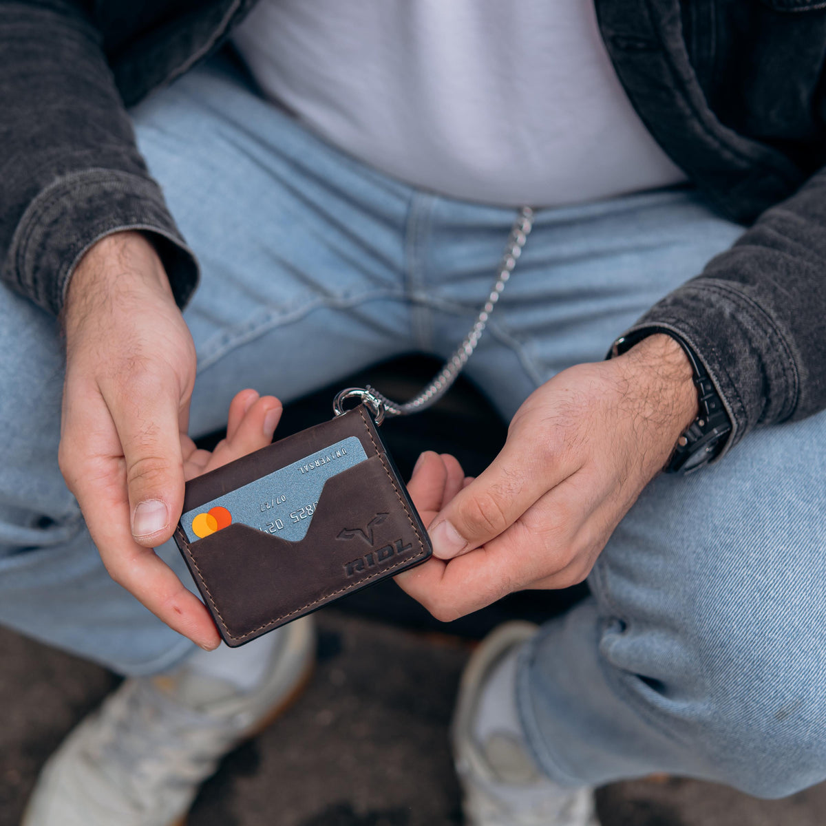 Handmade leather EDC wallet with magnetic closure, zip pocket and ID window by RIDL