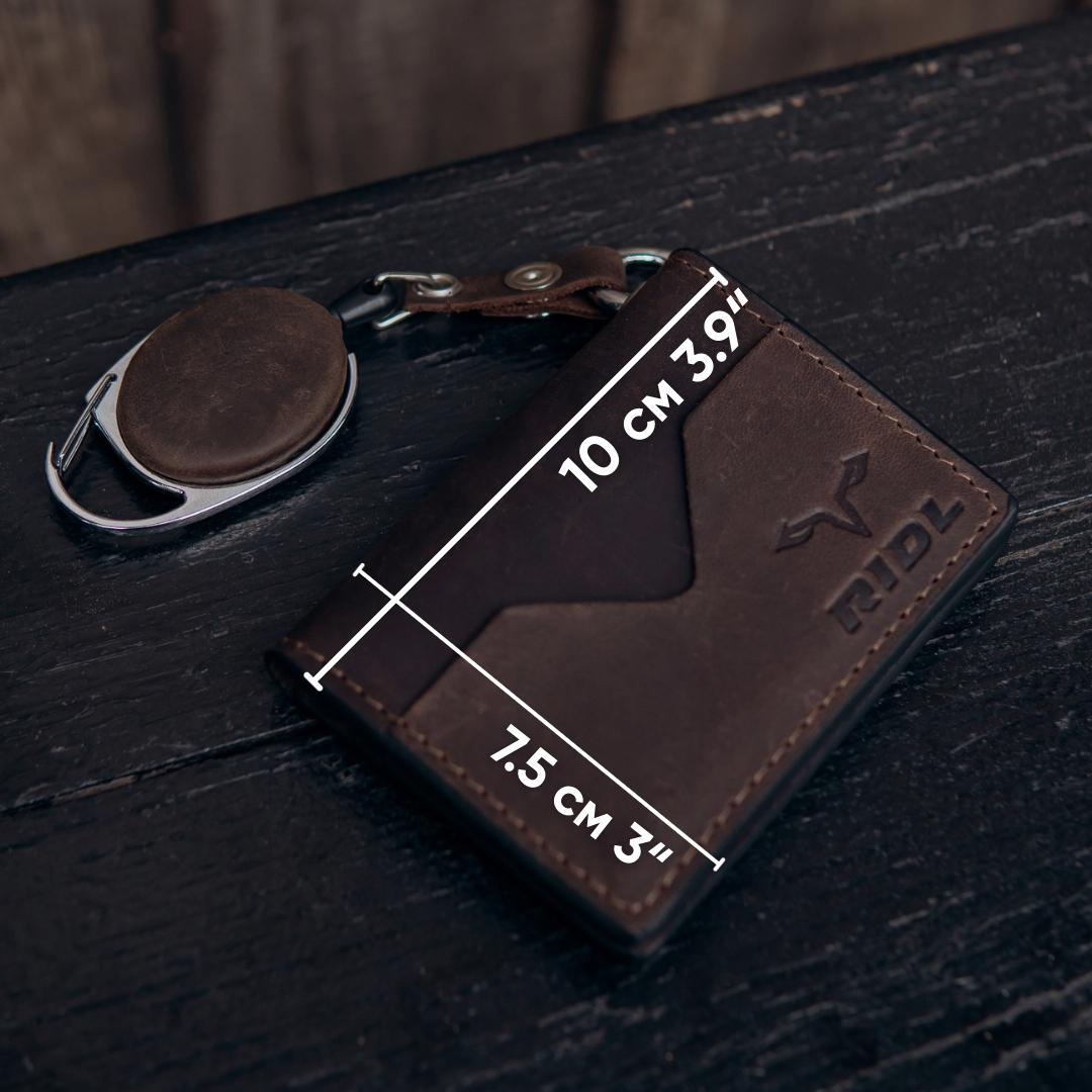 Handmade leather EDC wallet with magnetic closure, zip pocket and ID window by RIDL