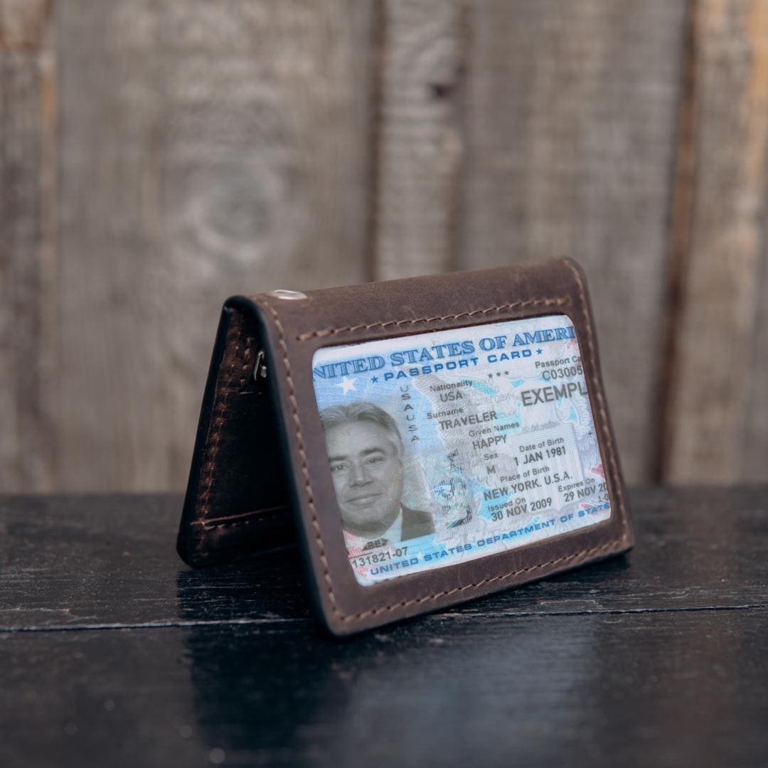 Handmade leather EDC wallet with magnetic closure, zip pocket and ID window by RIDL