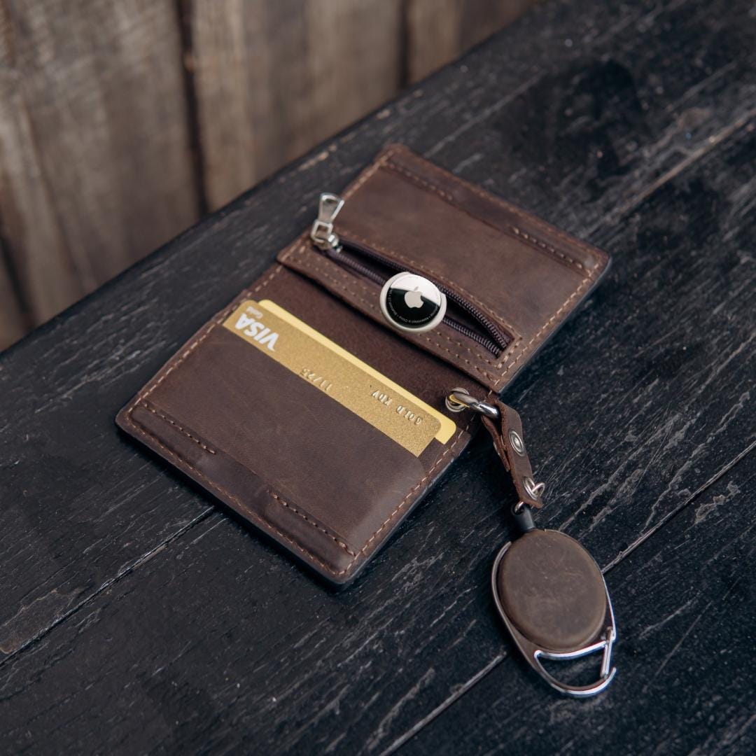 Handmade leather EDC wallet with magnetic closure, zip pocket and ID window by RIDL