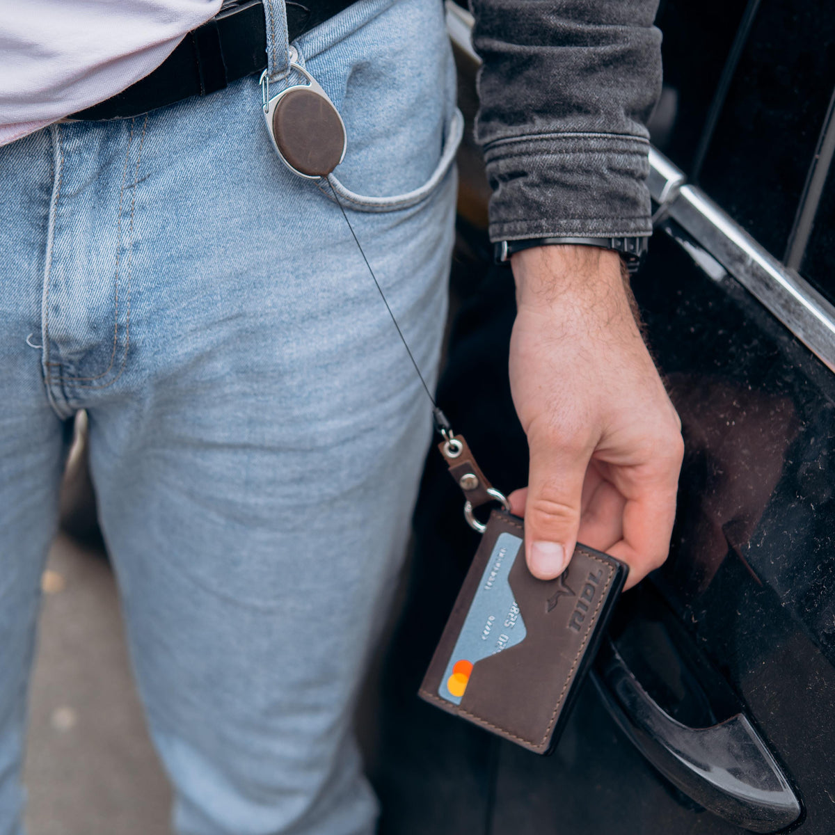 Handmade leather EDC wallet with magnetic closure, zip pocket and ID window by RIDL