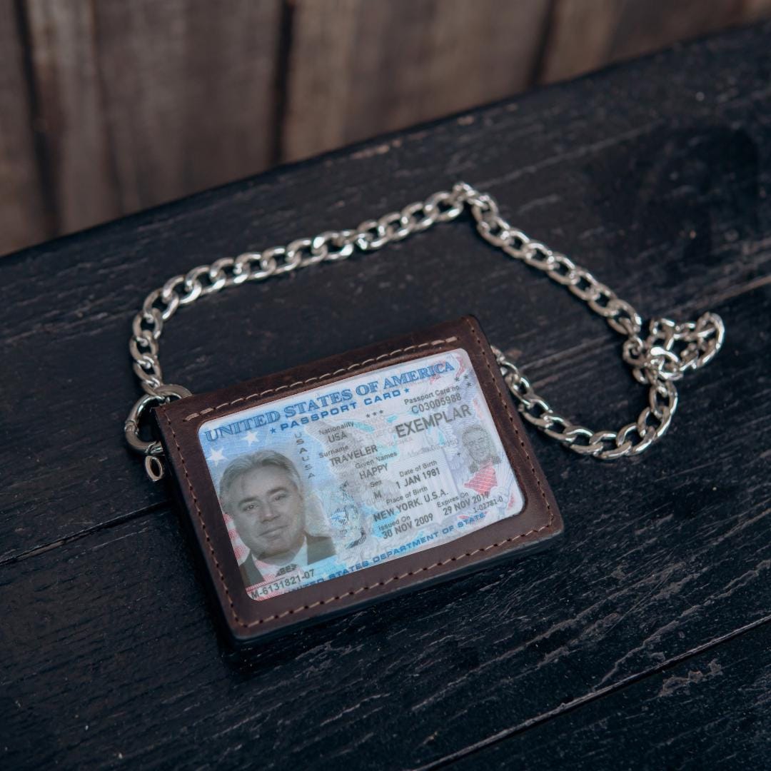 Handmade leather EDC wallet with magnetic closure, zip pocket and ID window by RIDL