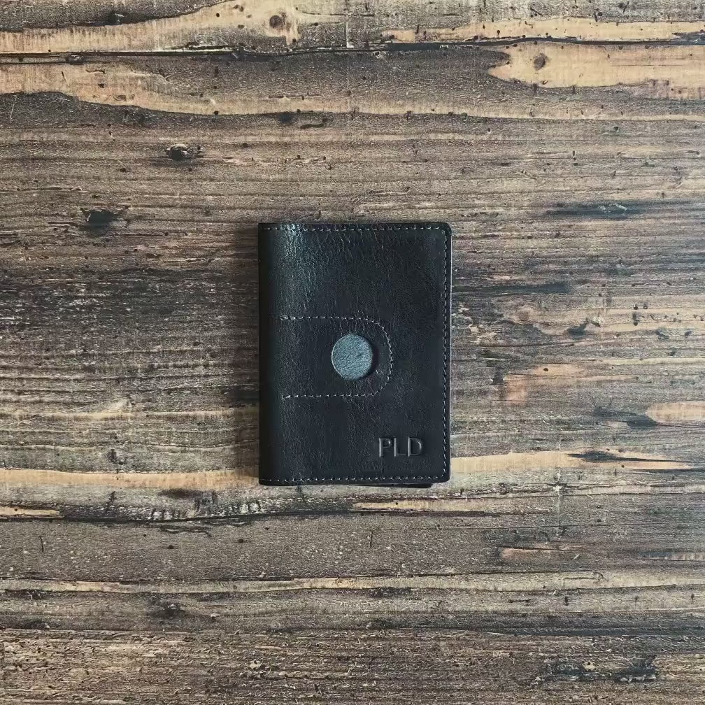 Video of the RIDL leather passport wallet with AirTag slot