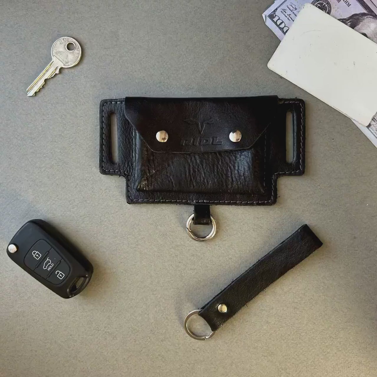 Video of the RIDL leather belt pouch card holder with key carabiner