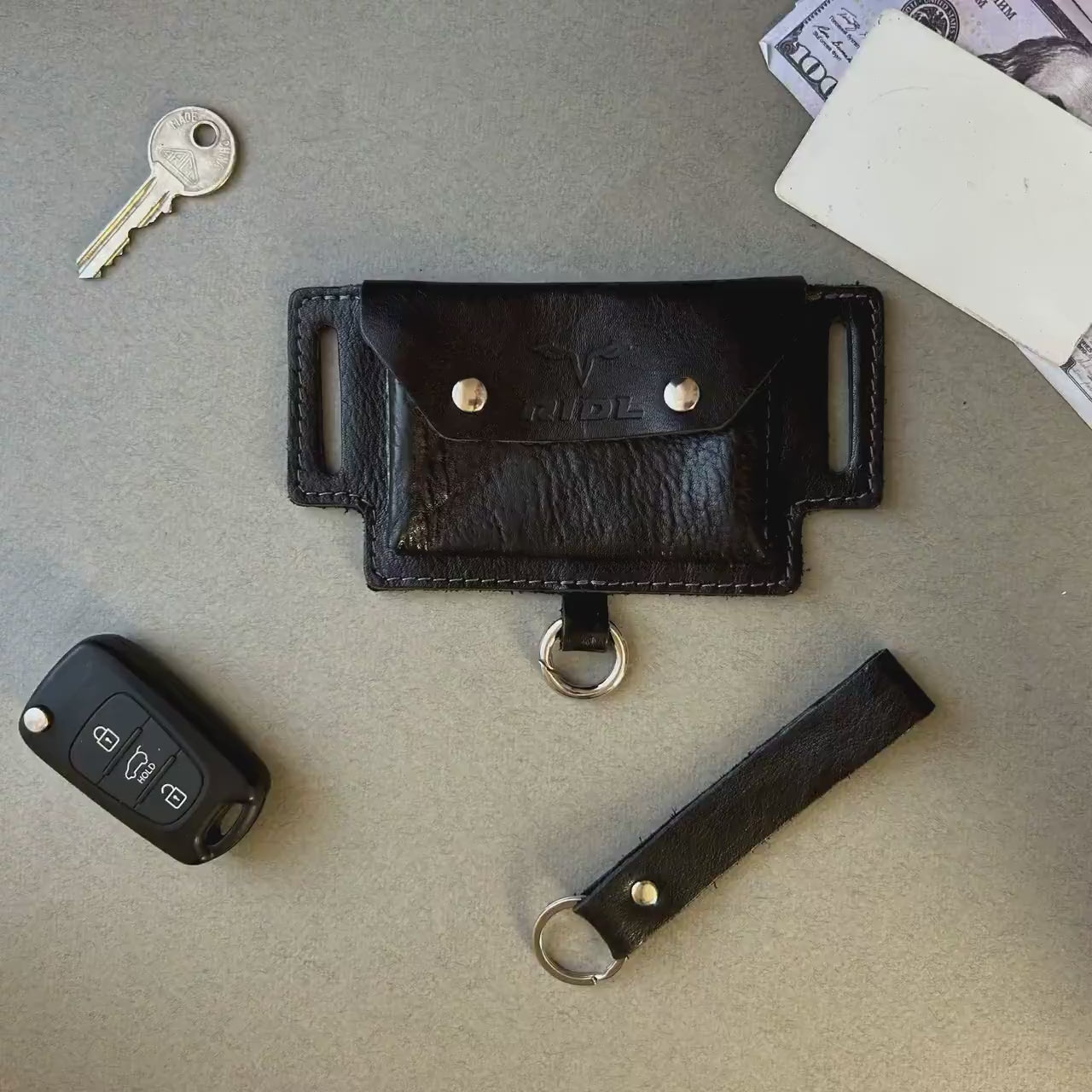 Video of the RIDL leather belt pouch card holder with key carabiner